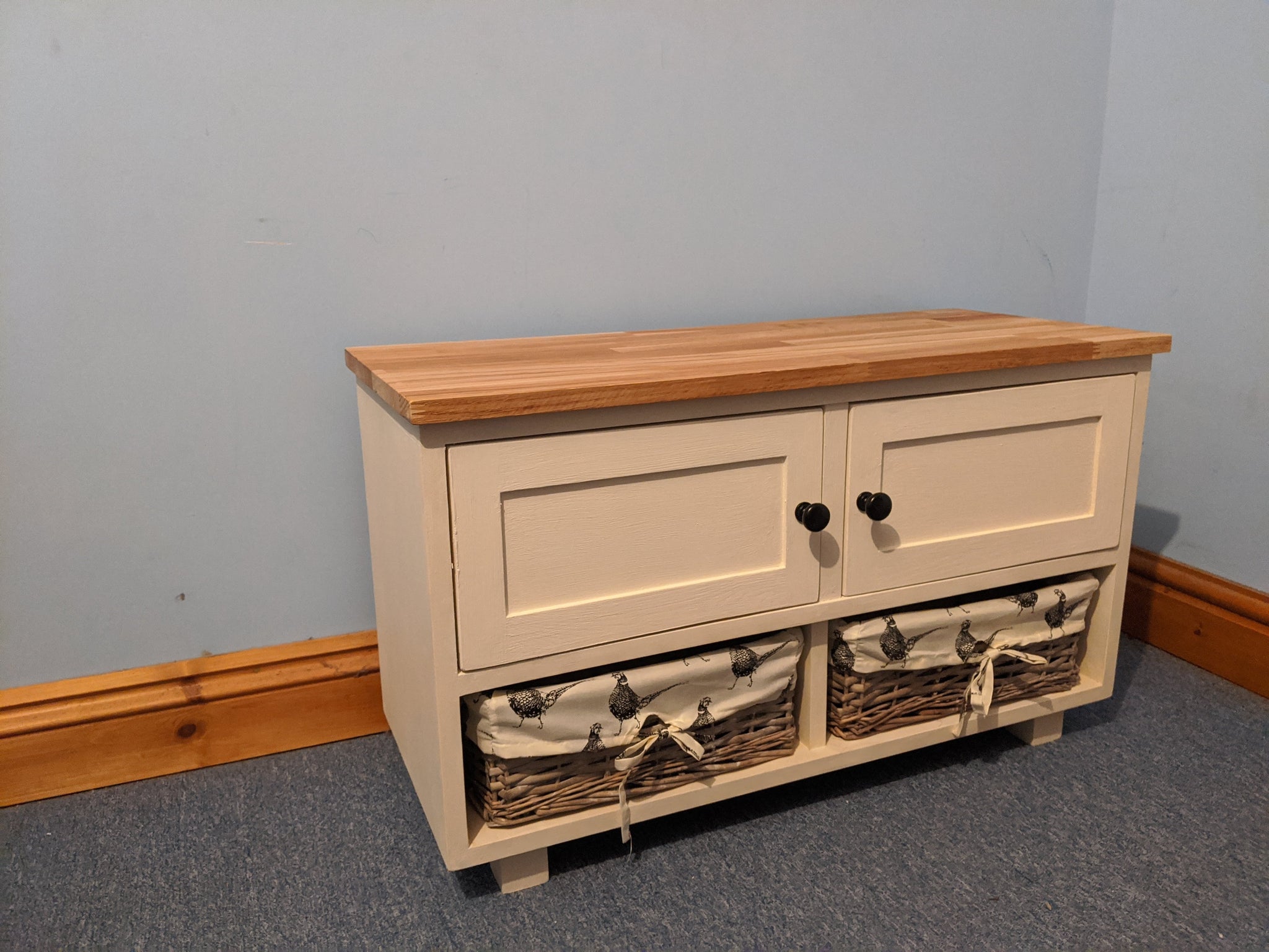 Wooden storage cabinet with wicker baskets discount